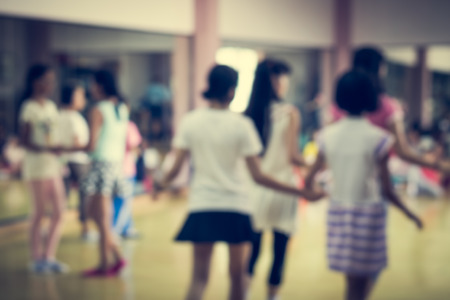 Blurred children are in dancing class for backgroundの写真素材