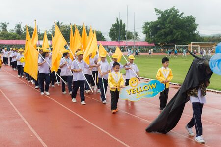 PHUKET, THAILAND - JUL 13 : Parade of schoolchild in the stadium on July 13, 2016. Opening ceremony of yearly athletics competition of Anuban Phuket School in phuket, Thailandのeditorial素材