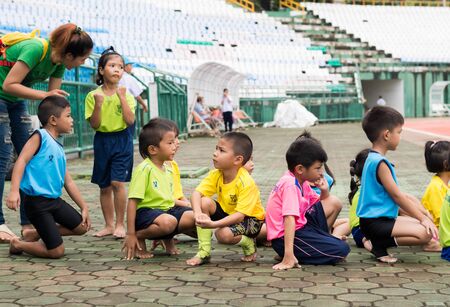 PHUKET, THAILAND - JUL 13 : Schoolchild runners are preparing in the stadium on July 13, 2016.  Yearly athletics competition of Anuban Phuket School in phuket, Thailandのeditorial素材
