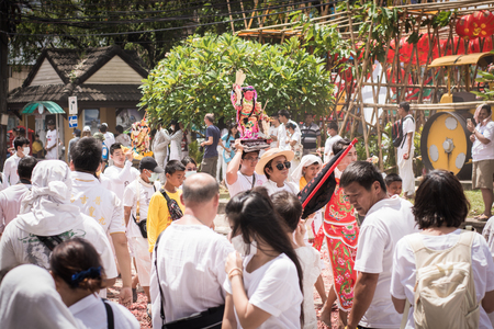 PHUKET- OCT 07 : Taoism participants in a street procession of the Phuket Vegetarian Festival on Oct 07, 2016 in Phuket, Thailand. During festival devotees abstain from eating meat to appease the God.のeditorial素材