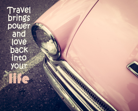 Inspirational quote on pink vintage car background. " Travel brings power and love back into your life "の写真素材