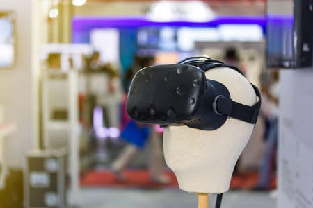 Close up head of mannequin wear Vr visual on blur background with copy space