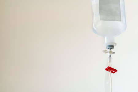 Sodium chloride or saline solution fluid iv irrigation transparent drip bag and tubing at room in...