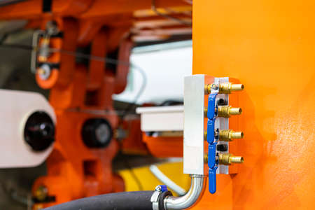 Industrial brass hose connector or coupling with valve install at aluminum high pressure die cast machineの写真素材