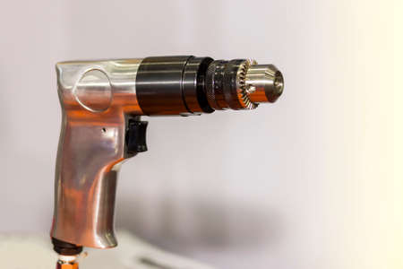Small high speed drill air tool with collet chuck for quick and easy make hole in industrial workの写真素材