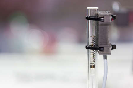 high performance and technology accuracy and fast detected of moving pieces or dusts in tube (capacitive or tube sensor for industrial) with copy spaceの写真素材