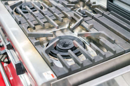 close up modern gas stove made from steel or cast iron or copper