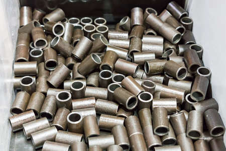 top view many steel pipe after cut process by automatic and accuracy band saw cutting machine or...