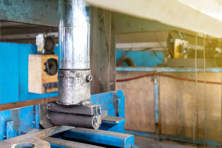 close up product during press down by manual hydraulic bending machine at factoryの写真素材