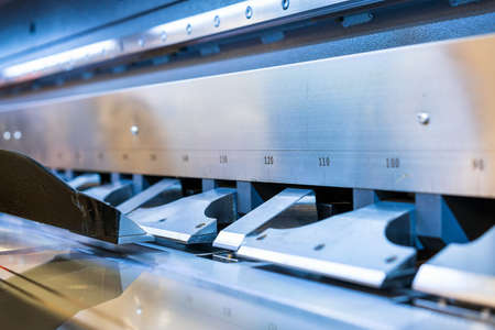 Close up teeth of semi automatic metal sheet bending machine for industrialの写真素材