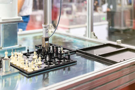 Automated modeling system checking and sorting handling and movement workpiece (sample chess) on...