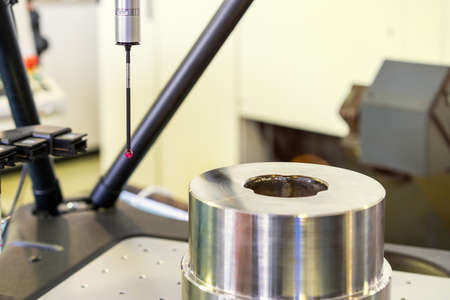 Close up head probe of automatic coordinate measurement machine (CMM) for inspection high precision...
