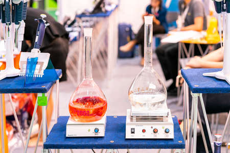flask or vials circular for solution liquid on automatic stir or magnetic stirrer vortex mixer & hot...