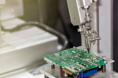 robotic system for automatic point soldering for printed and assembly electric circuit board ( PCB )...