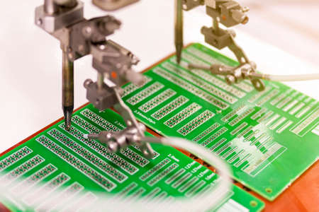 soldering iron tips of automated manufacturing soldering and assembly printed electric circuit board...