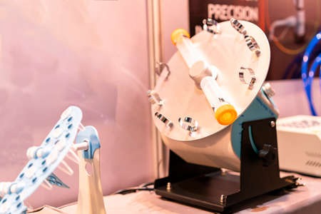 plastic test tube hold on discs rotator device of lab for solution mixing of physics chemistry biology lab application to industrial chemical petroleum pharmaceutical food & beverage cosmetics etc,の写真素材