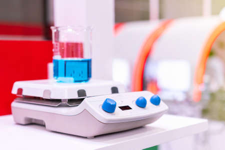 automatic digital stir or magnetic stirrer vortex mixer device of lab for solution liquid in beaker or vials circular motion for industrial chemical medicine & food and beverage cosmetics etcの写真素材