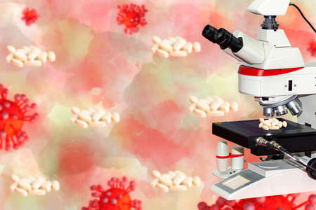 Drug on microscope or lab equipment with concept model covid 19 or coronavirus case of respiratory...