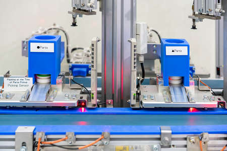 Close up high technology automation production conveyor line with path and sensor for select &...