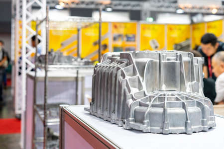 aluminum alloy cove crankcase engine part for automobile or vehicle before machining made from high pressure die casting process on tableの写真素材