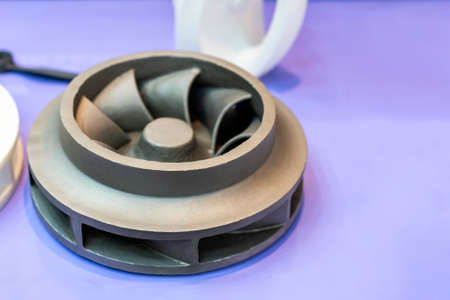 steel or brass alloy casting parts vane pump or propeller blades for industrial on tableの写真素材