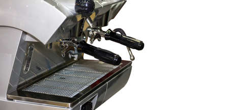 close up nozzle of modern and automatic of coffee making machine isolated on white background