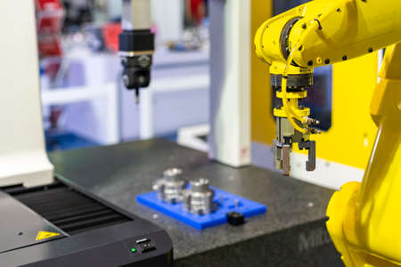 high technology robot grip with automatic clamp or chuck for catch and carry engine part or...