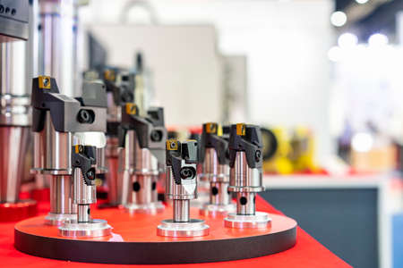 many size of holding shaft attach with insert carbide tip for cnc machining center or milling machine for manufacturing metal work process on tableの写真素材