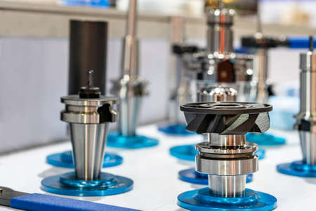 precision collect chuck and face holder head cutting tool for cnc milling machining center in industrial work on tableの写真素材