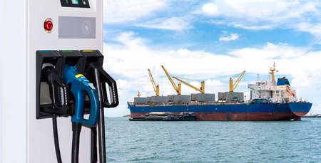 Electric station charger with plug and power cable supply and Large cargo ship for logistic import...