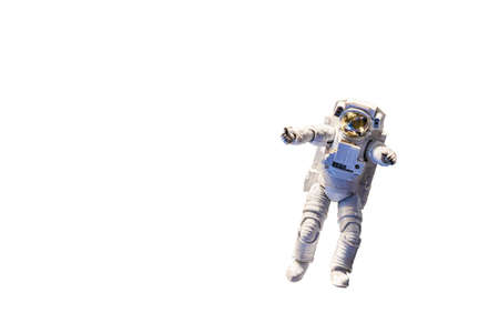 Statue or plastic model astronaut or spaceman isolated on white backgroundの写真素材