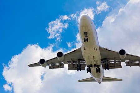 front bottom image large commercial passenger aircraft or cargo transportation airplane flying on...