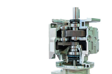 Cross section show metal cogs helical gear bearing housing shaft and other detail inside of  transmissions gearbox for industrial isolated on whiteの写真素材