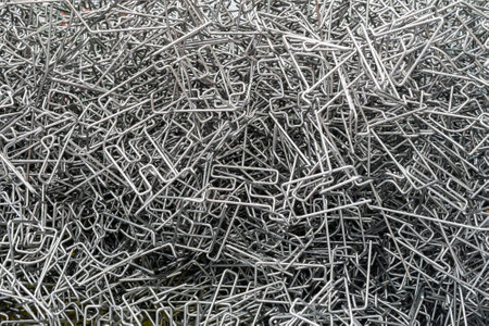 top view many steel parts wire bend or workpiece after forming by automatic and precision cnc 3d...
