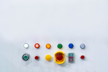 Various electric power control push button switch and status lamp select on off emergency switch and other for industrial machine install on cabinet with copy spaceの写真素材
