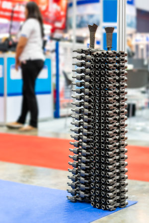 casting tree stack iron parts with gating system riser runner and pouring cup from shell mold or green sand manufacturing process of industrial on groundの写真素材