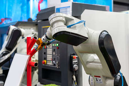 high technology & precision robot grip with automatic clamp or chuck for catch workpiece or parts for remove or assembly in manufacturing processの写真素材