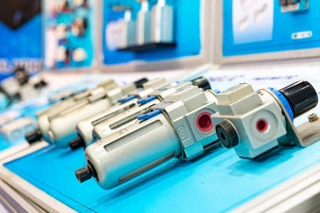 Pneumatic equipment precision air filter regulator and lubricator for machine system or automation manufacturing process in industrial on tableの写真素材
