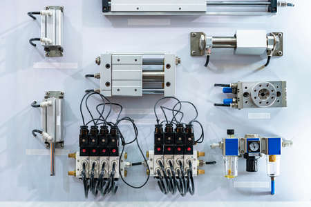 various type pneumatic equipment e.g. air cylinder and rotary pneumatic cylinder table manifolds solenoid valve filter regulator for automatic system or automation manufacturing process in industrialの写真素材