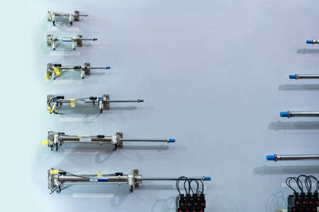 Various size pneumatic equipment e.g. air compact cylinder for automatic machine system or automation manufacturing process in industrialの写真素材