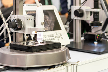 High quality video microscope during inspection drill bit on stage for appearance check and etc of quality control in industrialの写真素材