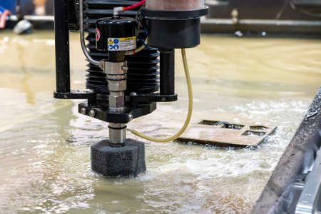 close up seat nozzle of precision automatic cnc high speed & pressure water jet cutting machine for manufacturing process in industrialの写真素材