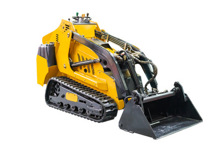 excavator tracked loader or crawler with front boom bucket dipper component for heavy construction digging and loading material isolated on white with clipping pathの写真素材