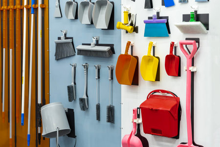 difference type home and garden tool hanging on board such as dustpan mob etc.の写真素材