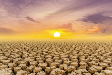 The concept of natural drought of the environment on Earth: dry soil, cracked soil with soil erosion Becomes red that is not agriculturalの写真素材