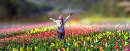 Woman standing in the flower farm