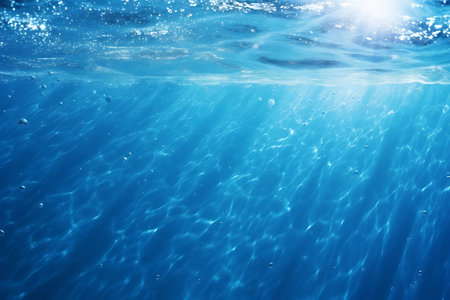 Clear blue water surface with beautiful splashing ripples and soap bubbles. Abstract summer banner backgroundの素材