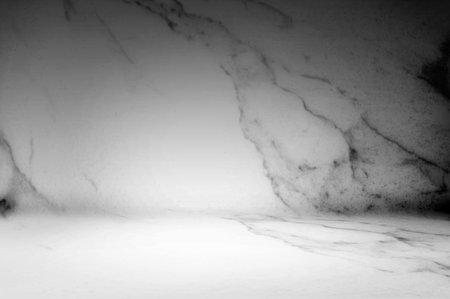 (Background) Dark concrete surface with fog in an abstract patternの写真素材