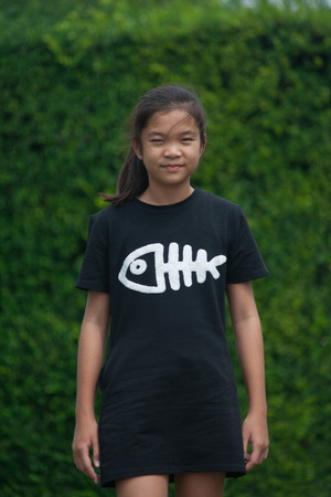 Shoot portrait of Asian children in public park outdoor.の写真素材