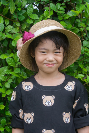 Shoot portrait of Asian children in public park outdoor.の写真素材